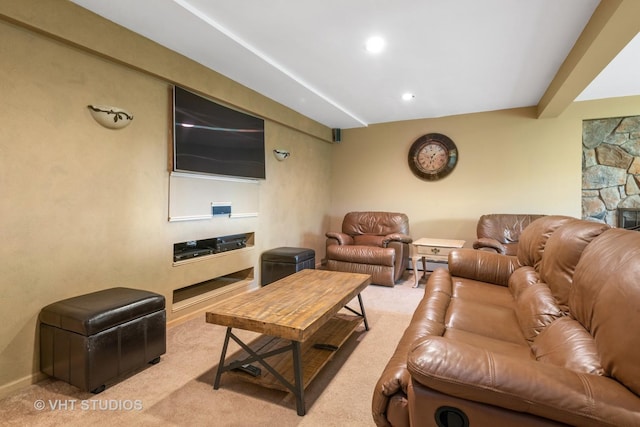 carpeted living room with a baseboard radiator