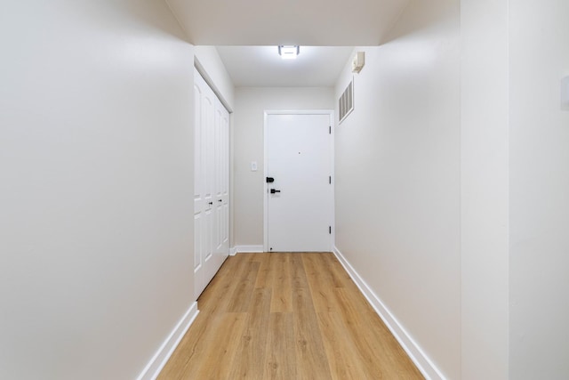 hall featuring light wood-type flooring