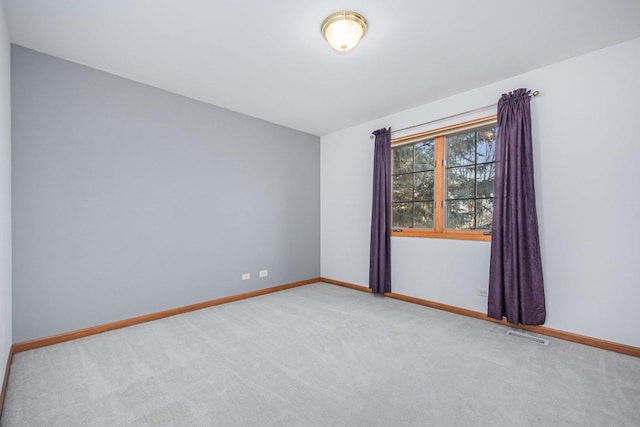 view of carpeted spare room