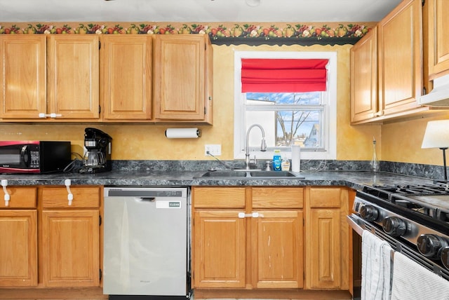 kitchen with range with gas cooktop, dishwasher, sink, and light brown cabinets