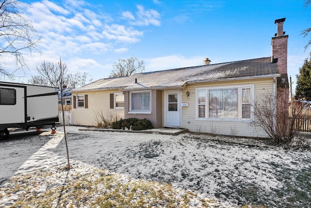 view of snow covered property