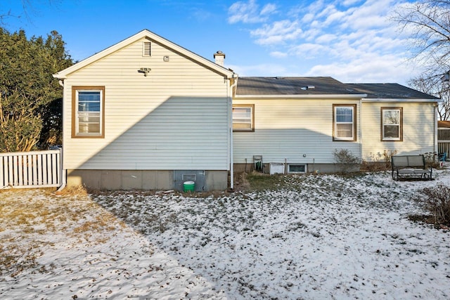 view of snow covered property