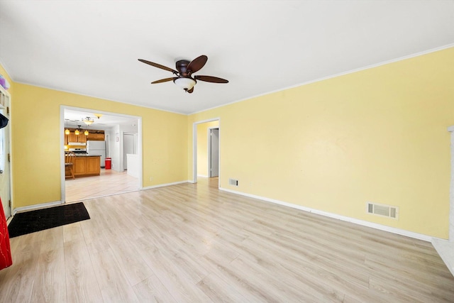 unfurnished living room featuring ceiling fan, light hardwood / wood-style flooring, and crown molding