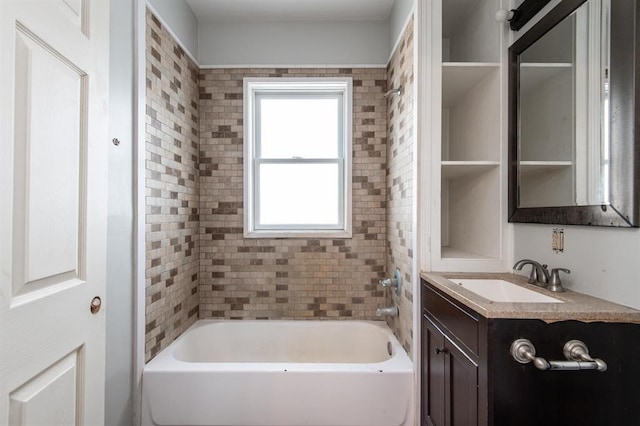 bathroom featuring vanity and shower / bathtub combination