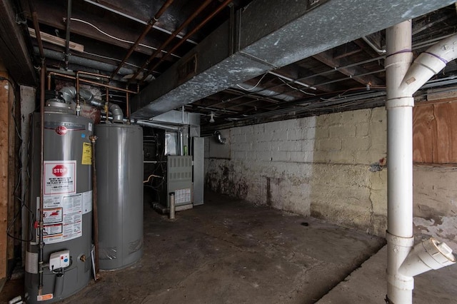 basement with heating unit and water heater