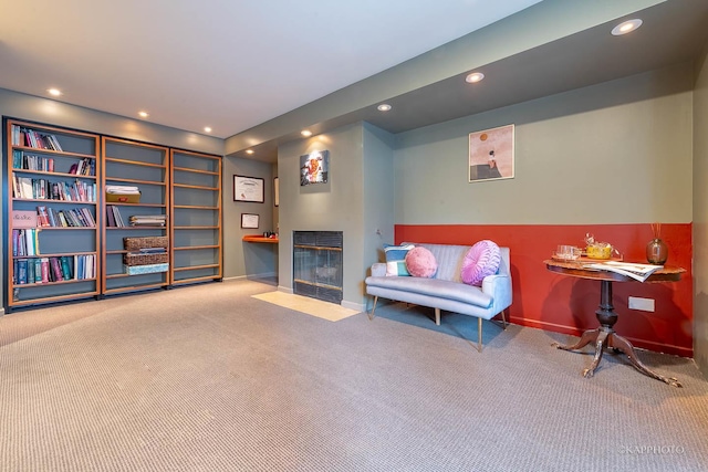 sitting room featuring carpet