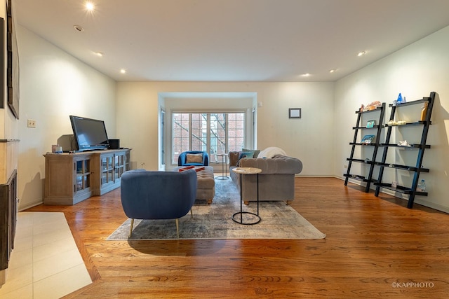 living room with light hardwood / wood-style floors