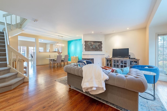 living room with hardwood / wood-style flooring and plenty of natural light