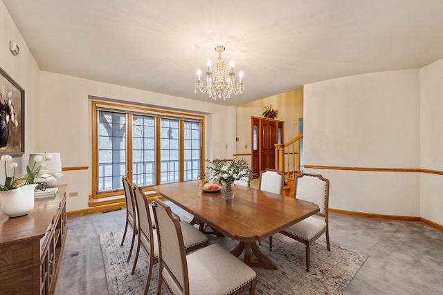 carpeted dining area with a notable chandelier