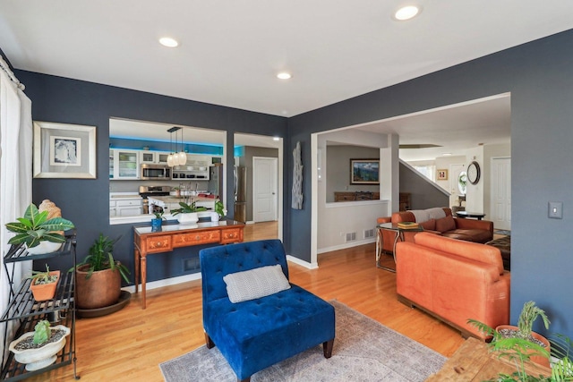 living area featuring light hardwood / wood-style flooring