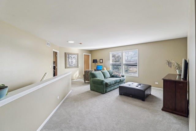 living room featuring light colored carpet