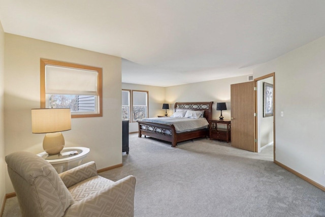 bedroom with light colored carpet