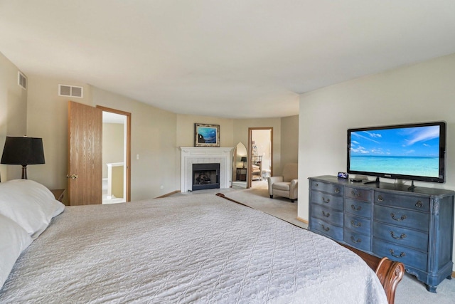 bedroom with light carpet