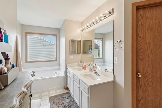 bathroom featuring vanity and a bathtub