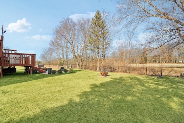 view of yard with a deck