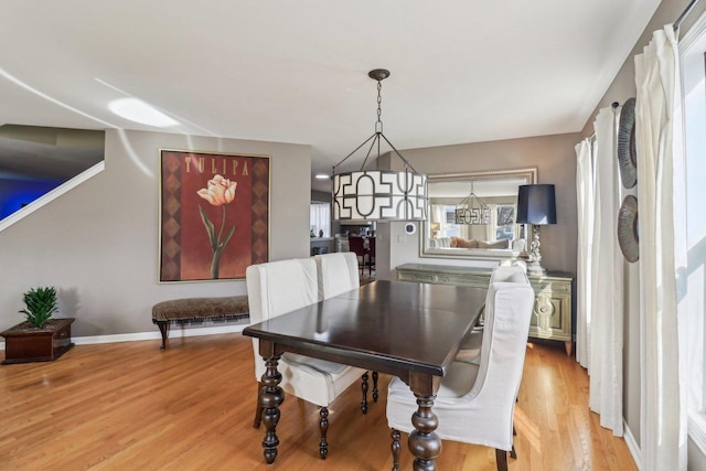 dining room with light wood-type flooring