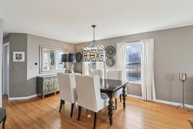 dining space featuring light hardwood / wood-style floors