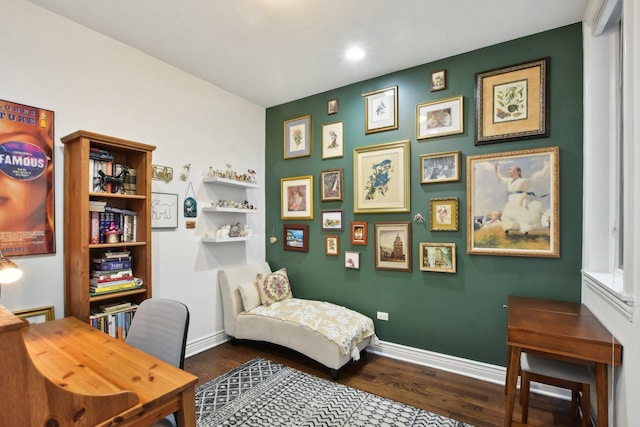 living area with dark hardwood / wood-style floors