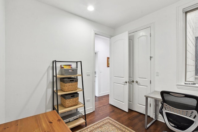 office area with a healthy amount of sunlight and dark wood-type flooring