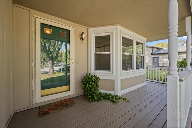 doorway to property with a porch