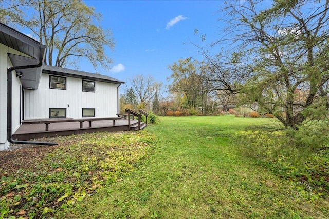 view of yard featuring a deck