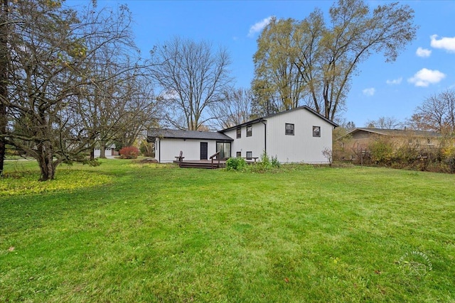 view of yard featuring a wooden deck