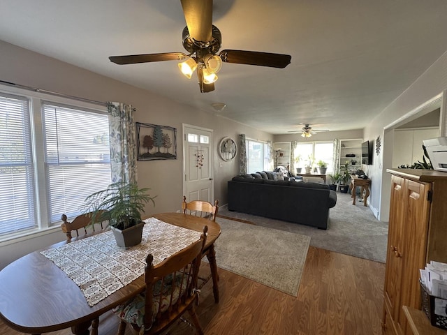 dining area featuring hardwood / wood-style floors and ceiling fan