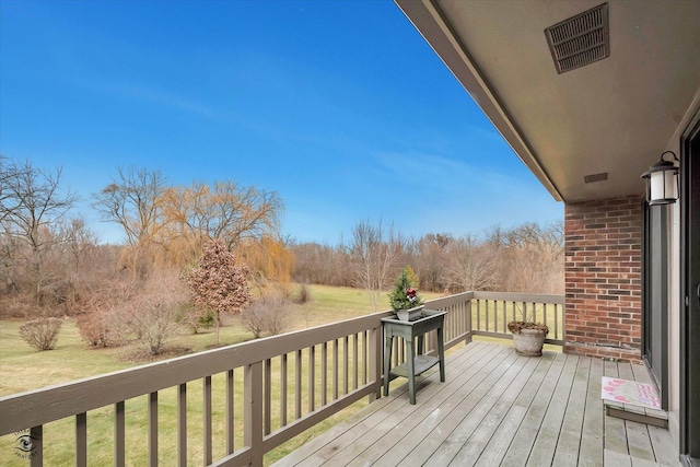 deck featuring a yard