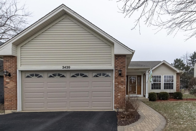 view of front of home featuring a garage