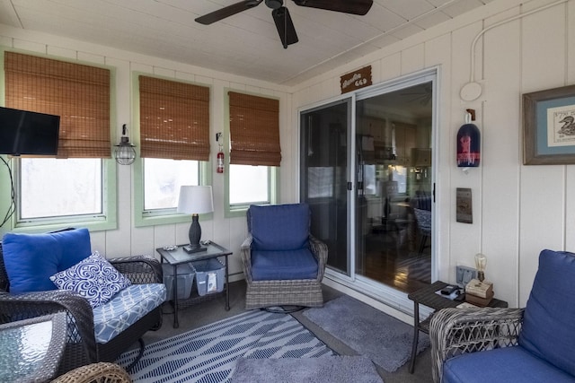 sunroom / solarium with ceiling fan