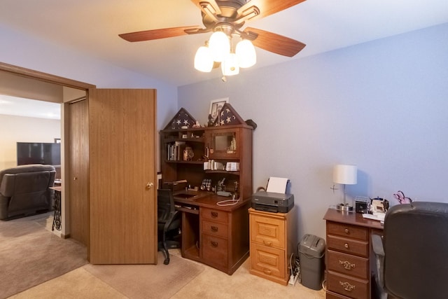 office area with ceiling fan and light carpet