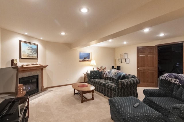 living room featuring light carpet and a fireplace