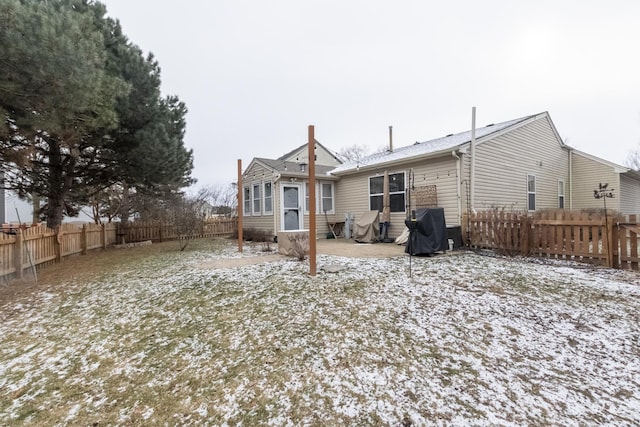 view of snow covered house