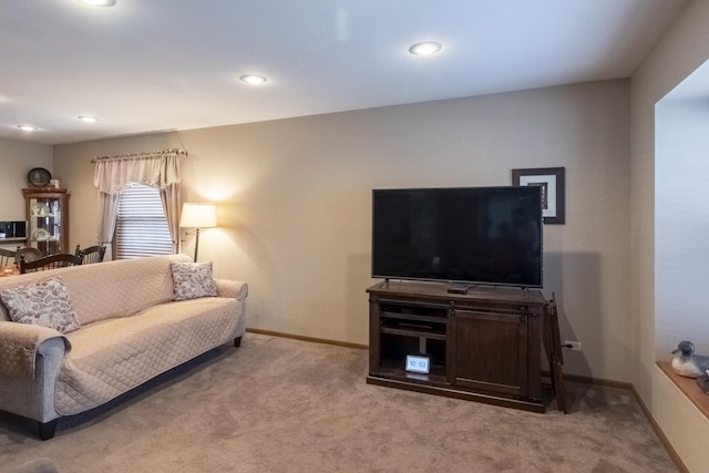 living room featuring light colored carpet