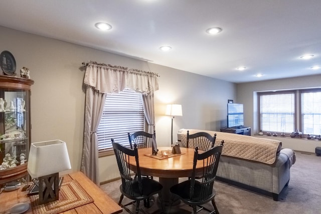 view of carpeted dining space