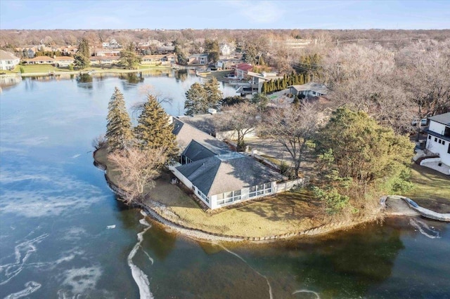 bird's eye view with a water view