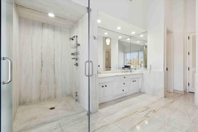 bathroom with vanity and walk in shower