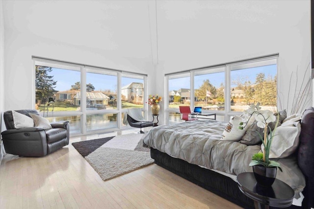 bedroom with light wood-type flooring