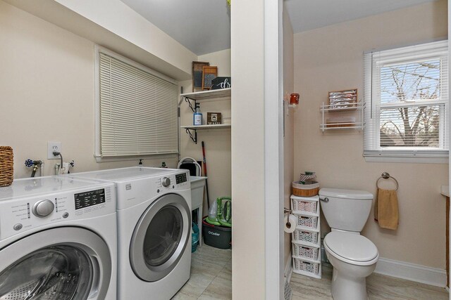 laundry area featuring washer and clothes dryer