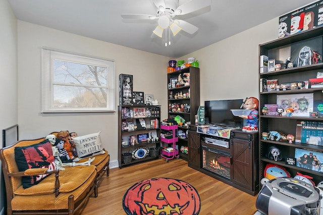 office area featuring light hardwood / wood-style flooring and ceiling fan