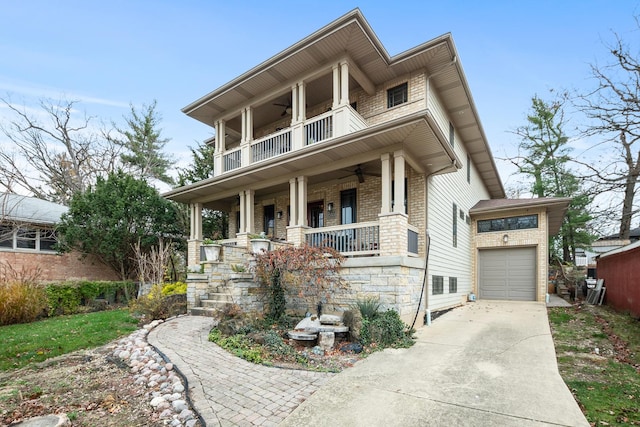 view of front of property featuring a balcony and covered porch