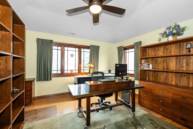 office area with ceiling fan and light hardwood / wood-style flooring