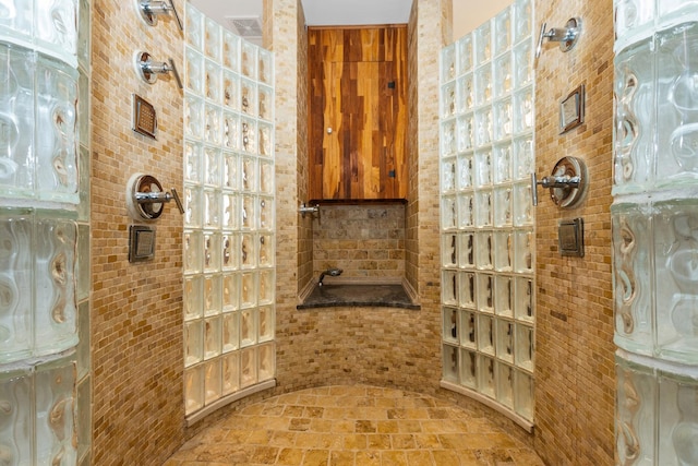 bathroom featuring walk in shower