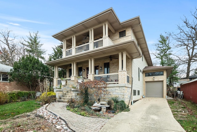 view of front of house with a porch, a balcony, and a garage