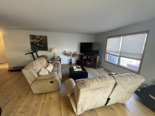 living room with light wood-type flooring