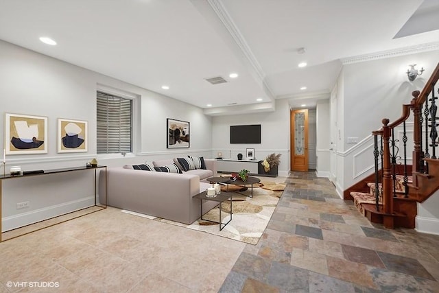 living room with ornamental molding