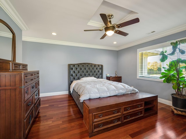 bedroom with ceiling fan, ornamental molding, and dark wood-type flooring