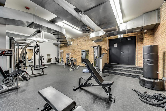 gym with brick wall