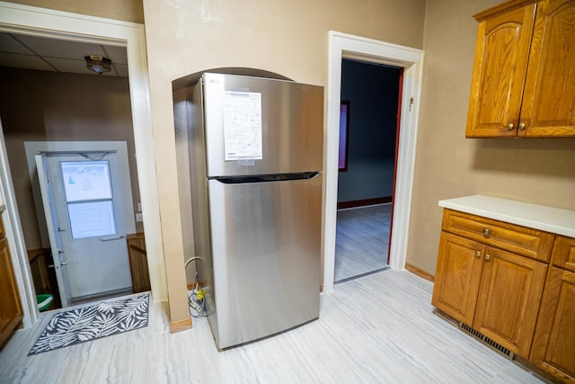 kitchen with stainless steel refrigerator