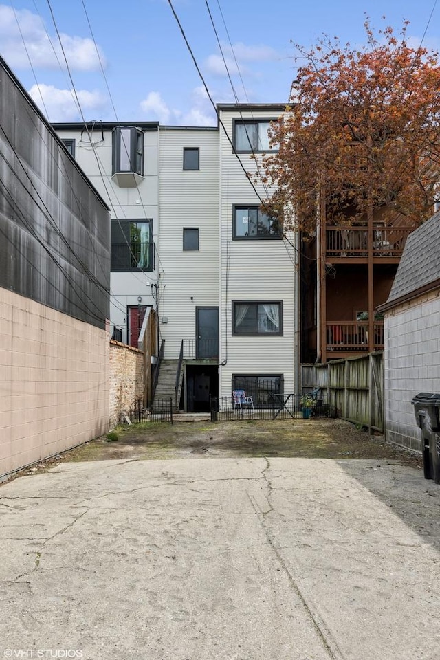 back of house with fence private yard